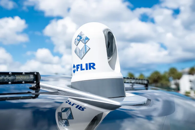  Yacht Photos Pics FLIR camera on 2019 Deep Impact 399 Sport boat under a blue sky.