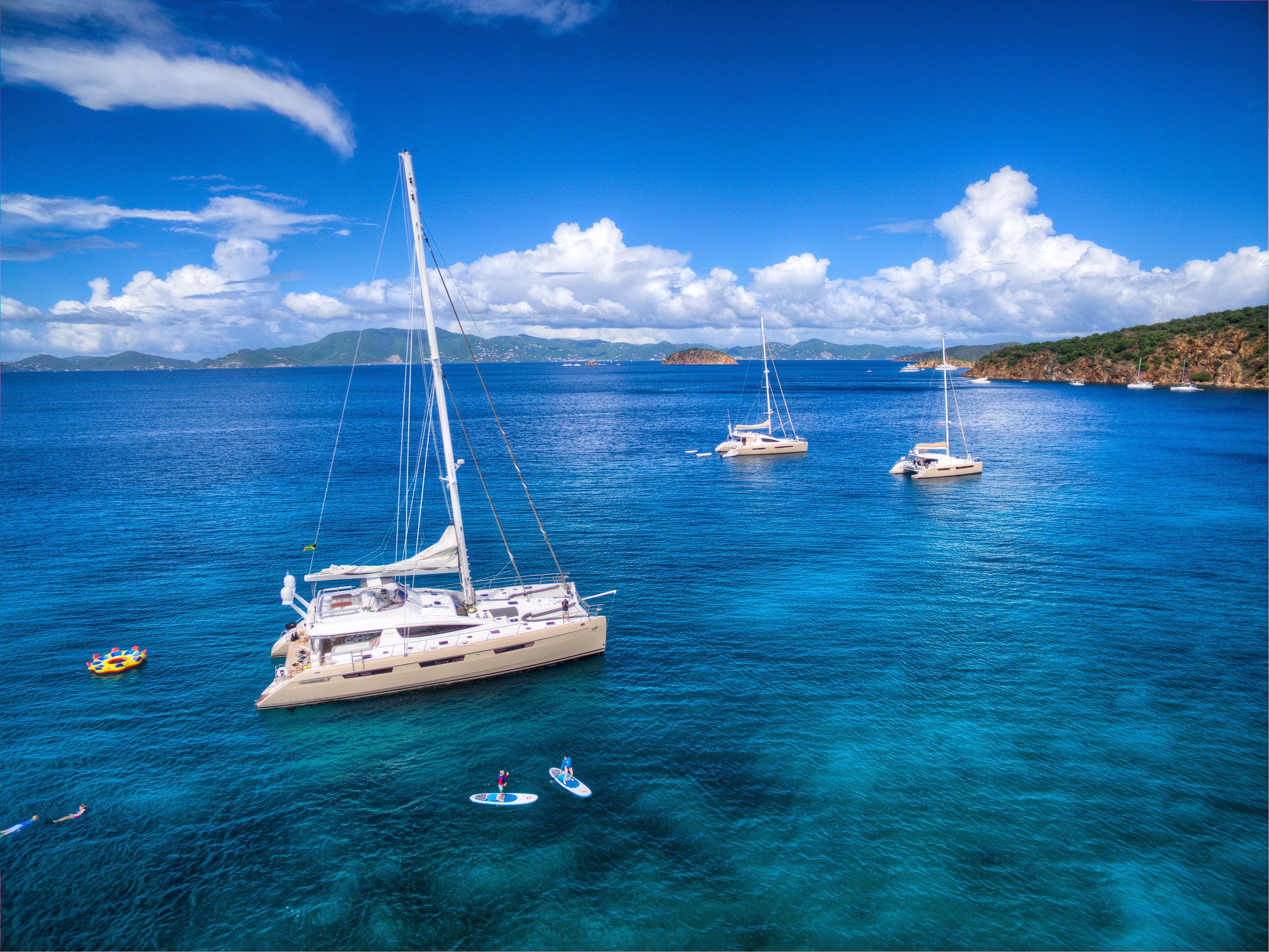 Luxury Privilege 745 yacht sailing in clear blue waters, 2010 model.