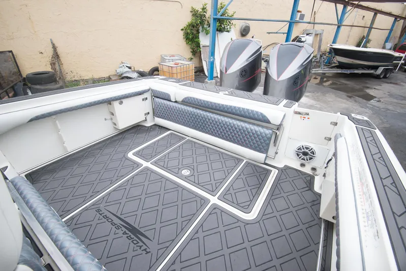  Yacht Photos Pics 2006 Hydra-Sports Vector 3300 VX boat deck with dual outboard motors.