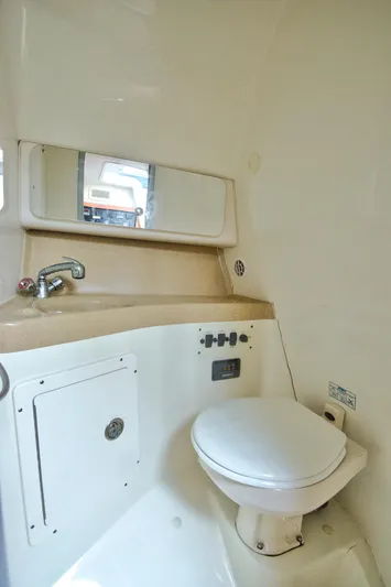  Yacht Photos Pics 2006 Hydra-Sports Vector 3300 VX boat bathroom with sink and toilet.