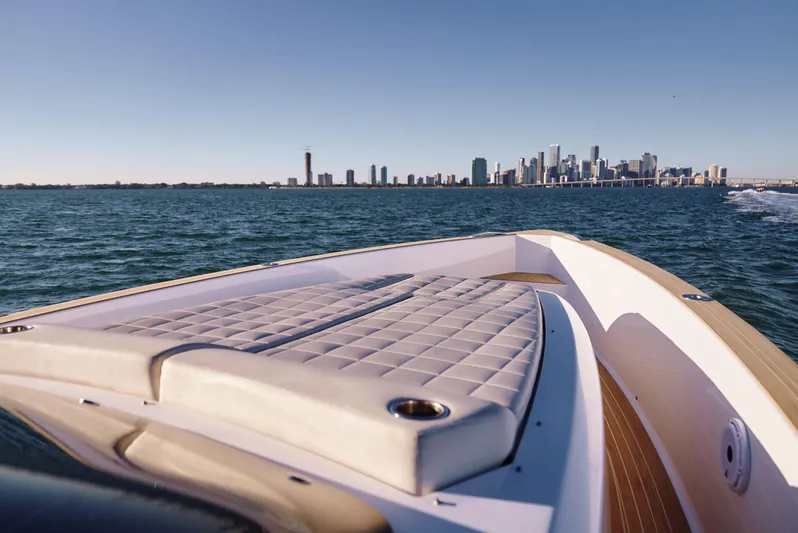 Yacht Photos Pics 2021 Pardo Yachts 38 cruising with city skyline in the background.