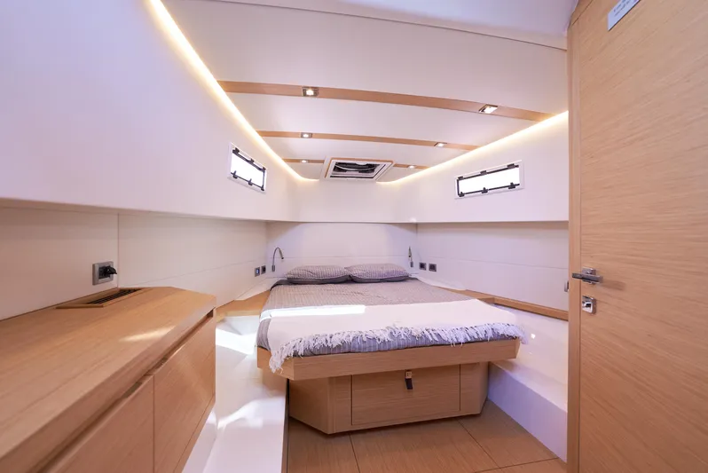  Yacht Photos Pics Luxurious cabin interior of 2021 Pardo Yachts 38 with modern design and cozy bed.