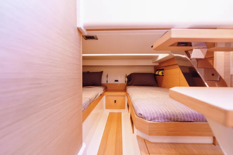  Yacht Photos Pics Interior of 2021 Pardo Yachts 38, featuring twin beds and modern wooden design.