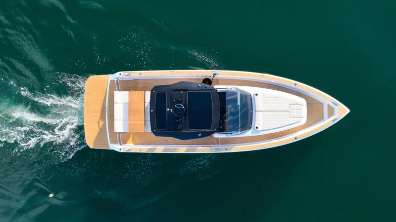  Yacht Photos Pics Top view of 2021 Pardo Yachts 38 cruising on clear water.