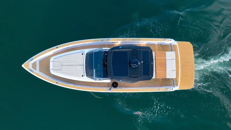  Yacht Photos Pics Overhead view of 2021 Pardo Yachts 38 cruising on clear blue water.
