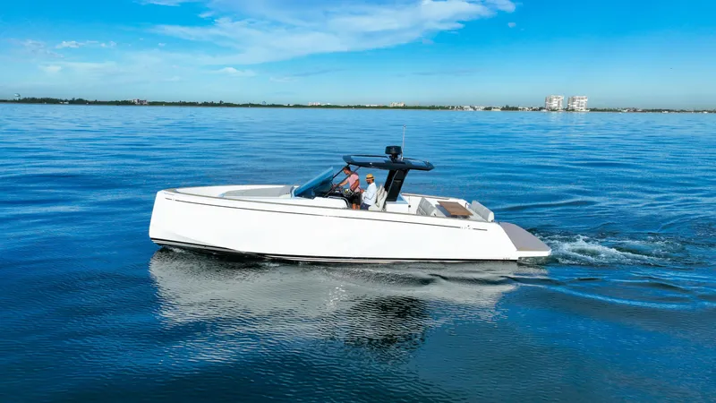  Yacht Photos Pics 2021 Pardo Yachts 38 cruising on calm blue waters under a clear sky.