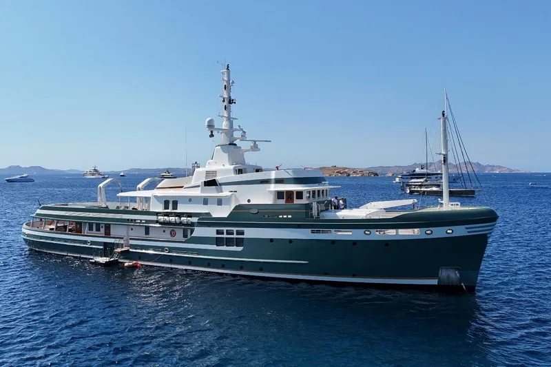 Steel Yacht Photos Pics Luxury Pendennis 55 yacht, 2009 model, anchored in serene blue waters.