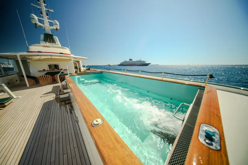 Steel Yacht Photos Pics Luxurious Pendennis 55 yacht with pool, ocean view, sunny day, 2009 model.