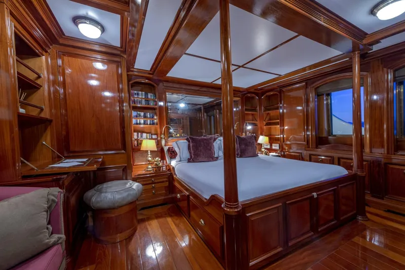 Steel Yacht Photos Pics Luxurious wooden interior of 2009 Pendennis 55 yacht bedroom with elegant furnishings.