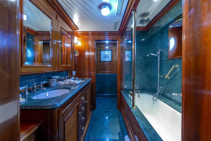 Steel Yacht Photos Pics Luxurious Pendennis 55 yacht bathroom, featuring elegant wood finishes and marble accents, built in 2009.