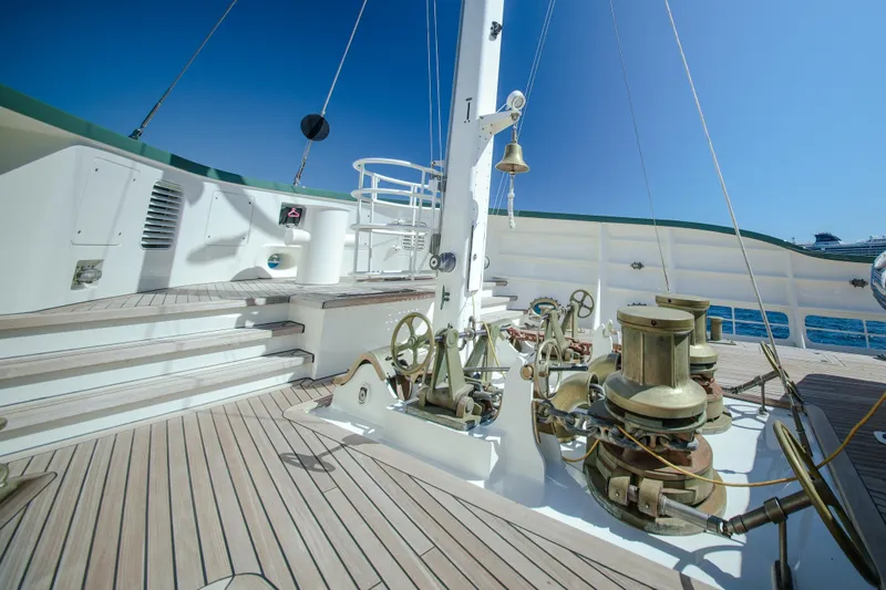 Steel Yacht Photos Pics Deck of 2009 Pendennis 55 yacht with nautical equipment and clear blue sky.