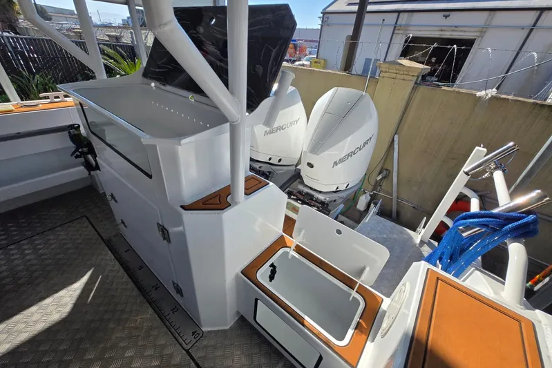  Yacht Photos Pics 2025 Custom Boat 34 with dual Mercury engines, spacious deck, and modern amenities.