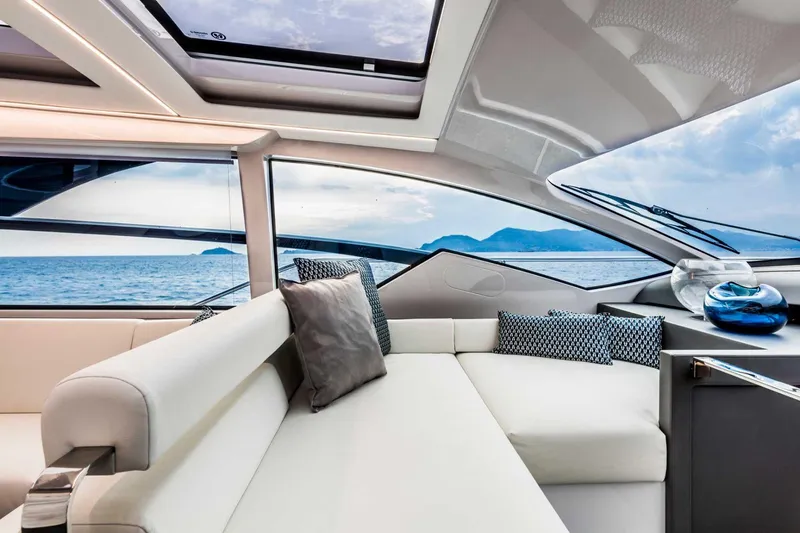 Dolcevita Yacht Photos Pics Luxurious interior of 2022 Pershing 5x yacht with ocean view and modern design.