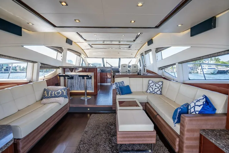  Yacht Photos Pics Luxurious interior of 2016 Sea Ray L650 Fly yacht with elegant seating and modern design.