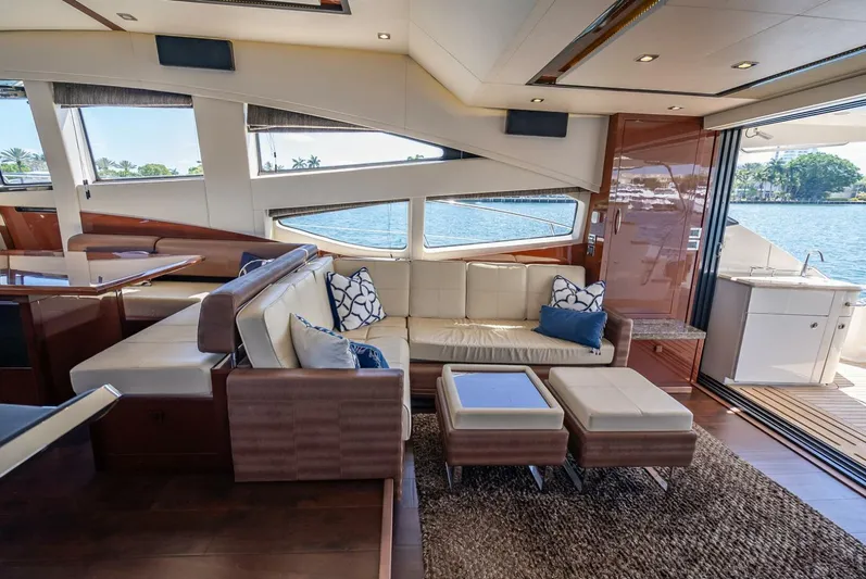  Yacht Photos Pics Luxurious interior of 2016 Sea Ray L650 Fly yacht with elegant seating and scenic water views.