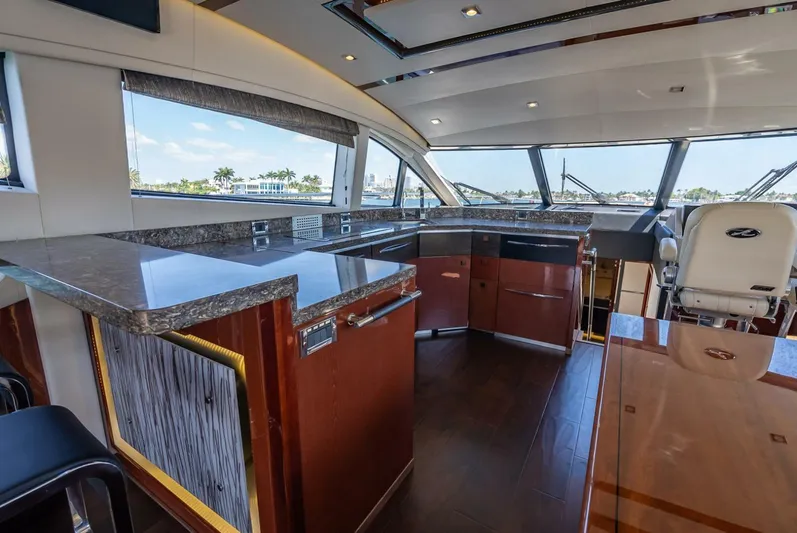  Yacht Photos Pics Luxurious interior of 2016 Sea Ray L650 Fly yacht with modern design and panoramic windows.