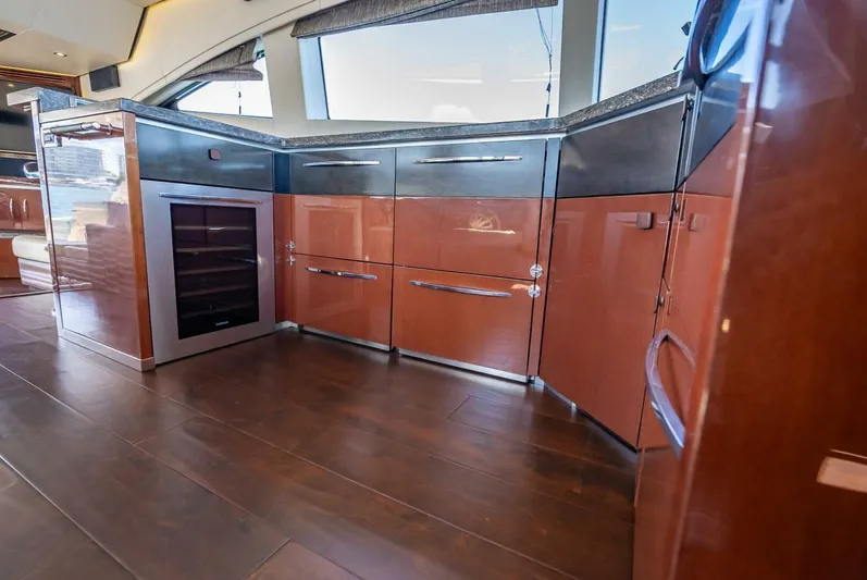  Yacht Photos Pics Luxurious kitchen interior of 2016 Sea Ray L650 Fly yacht with sleek cabinetry and modern appliances.