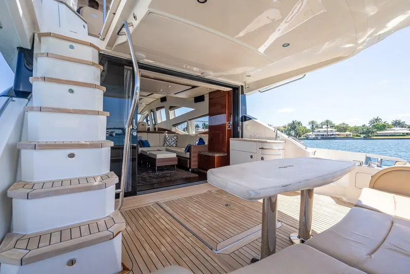  Yacht Photos Pics Luxurious 2016 Sea Ray L650 Fly yacht interior with elegant seating and scenic water view.