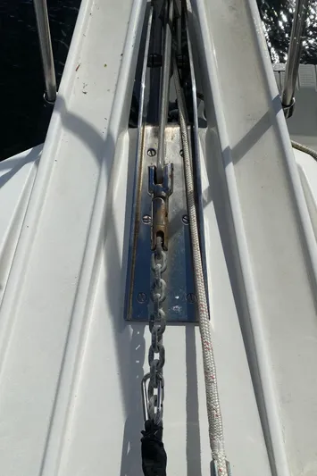 Mad East Yacht Photos Pics Close-up of 1993 Hatteras Convertible boat rigging and deck hardware.