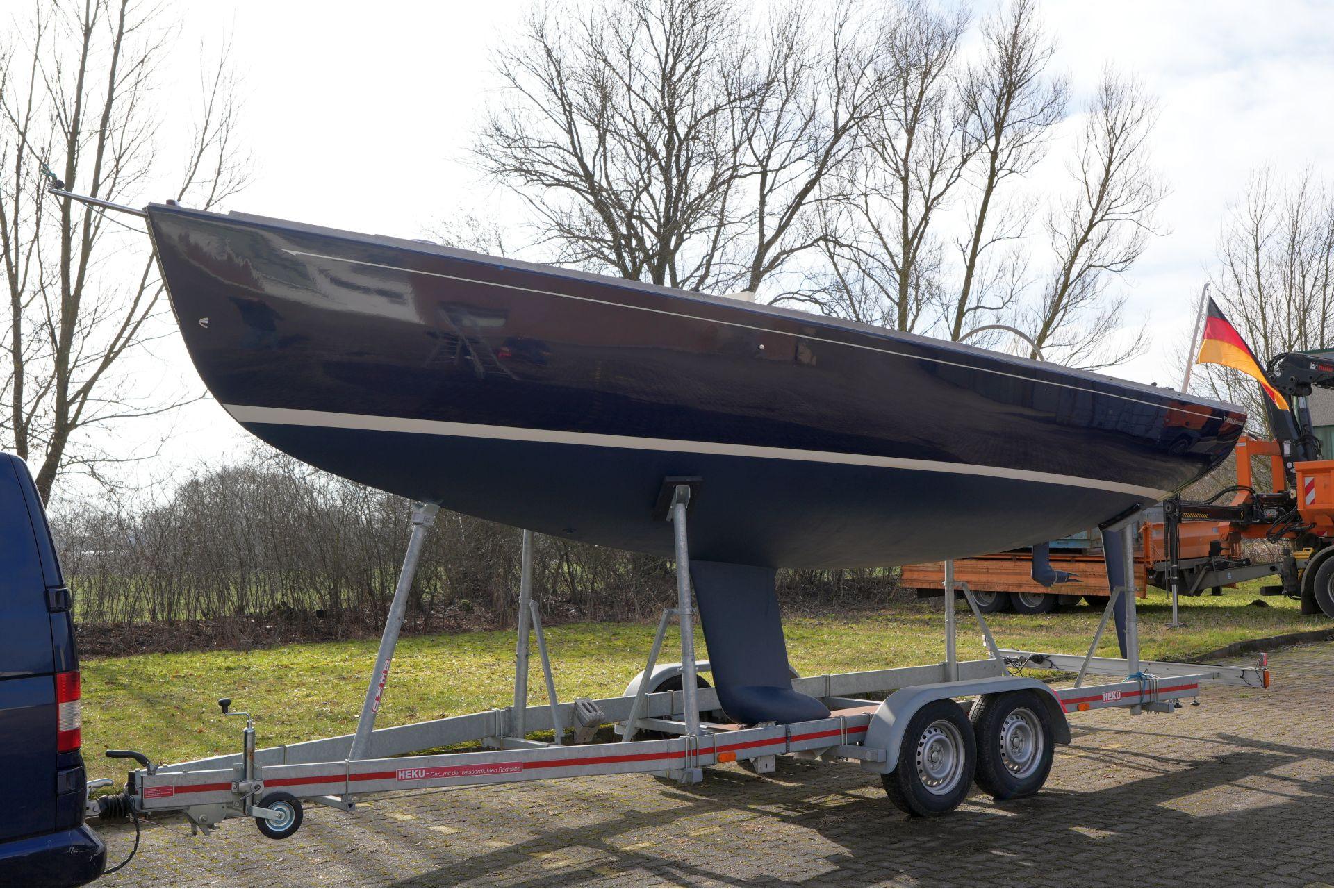 Saffier Se 26 sailboat on trailer, 2010 model, parked outdoors.