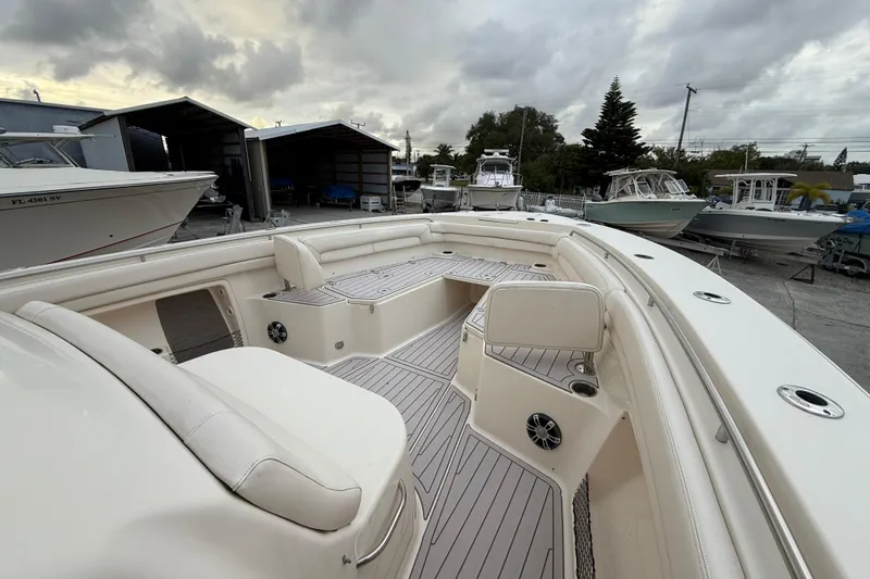 376-420 Brokerage Tyler Yacht Photos Pics 2020 Grady-White Canyon 376 boat interior with spacious seating and sleek design.