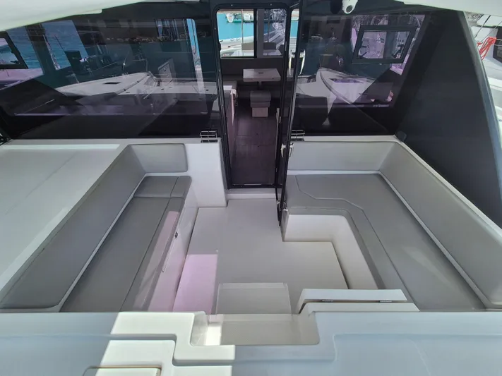 Takamaka Yacht Photos Pics Luxurious interior of a 2020 Leopard 50 yacht, featuring spacious seating and modern design.