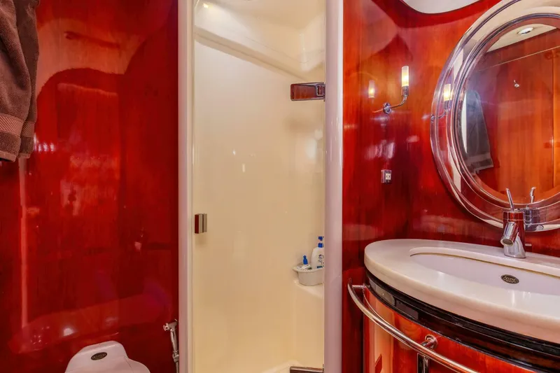 Patron Yacht Photos Pics Luxurious bathroom interior on 2004 Custom Ebony Sportfish 65' CNV yacht.