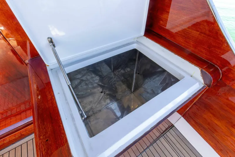 Patron Yacht Photos Pics Open storage compartment on 2004 Custom Ebony Sportfish 65' CNV yacht.