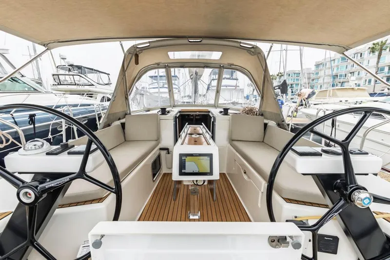 Dotwick Jinga Yacht Photos Pics 2020 Dufour 360 yacht cockpit with dual steering wheels and navigation system.