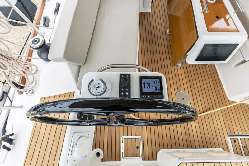 Dotwick Jinga Yacht Photos Pics Steering wheel and navigation instruments on 2020 Dufour 360 yacht deck.