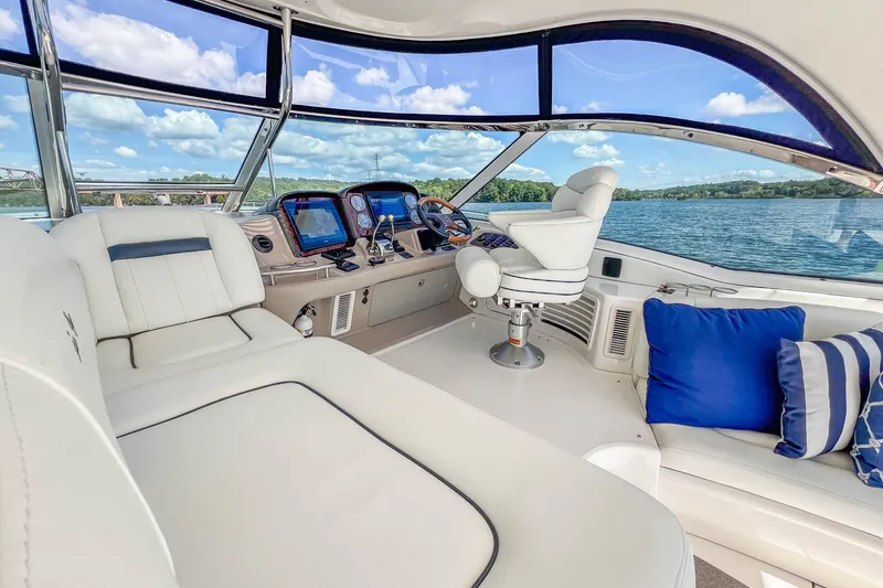 Night Moves Yacht Photos Pics Luxurious 2005 Sea Ray 500 Sundancer yacht interior with plush seating and scenic water view.
