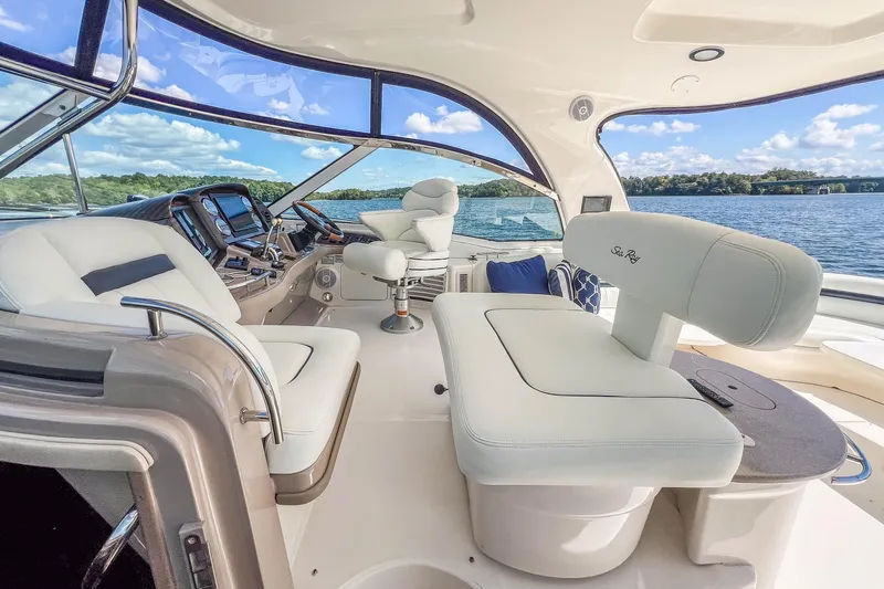 Night Moves Yacht Photos Pics Luxurious 2005 Sea Ray 500 Sundancer yacht interior with plush seating and scenic water view.