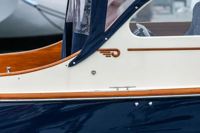 Belle Yacht Photos Pics 1998 Hinckley Picnic Boat with elegant wood trim and classic design details.