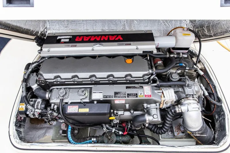 Belle Yacht Photos Pics Engine of a 1998 Hinckley Picnic Boat, featuring a Yanmar diesel engine.