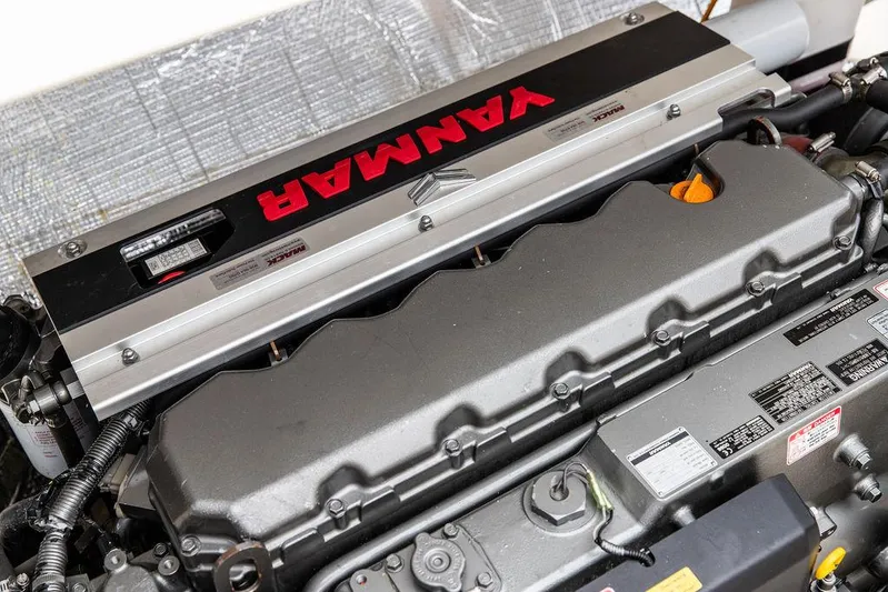 Belle Yacht Photos Pics Engine of a 1998 Hinckley Picnic Boat featuring a Yanmar diesel engine.