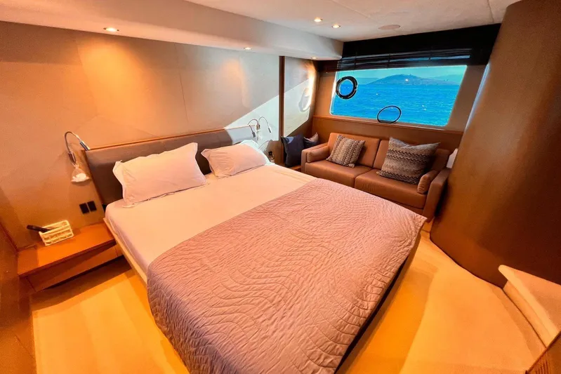  Yacht Photos Pics Luxurious bedroom interior of 2015 Princess Flybridge 52 Motor Yacht with ocean view.