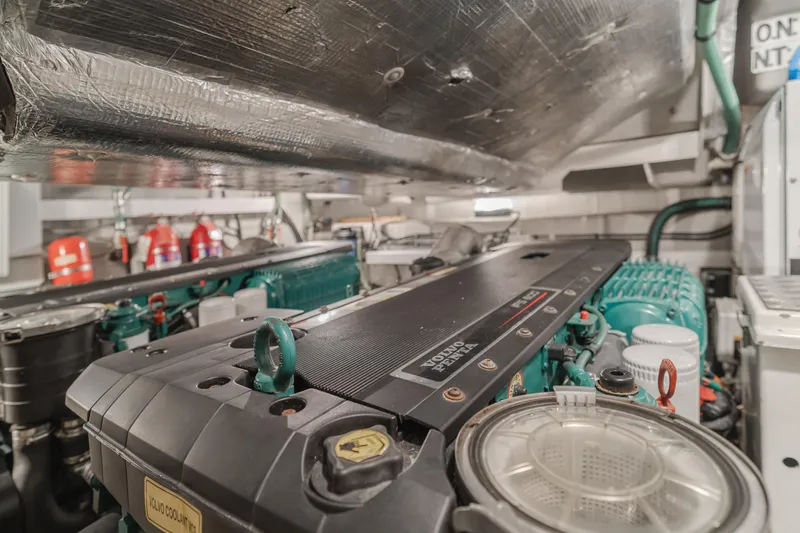 Tranquility Yacht Photos Pics Engine room of 2012 Sunseeker Portofino 48 yacht with Volvo Penta engines.