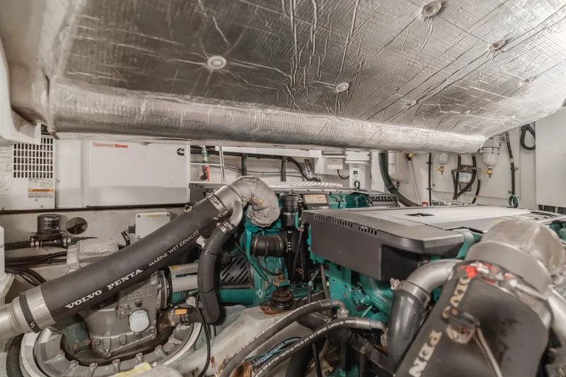 Tranquility Yacht Photos Pics Engine room of 2012 Sunseeker Portofino 48 yacht with Volvo Penta components.