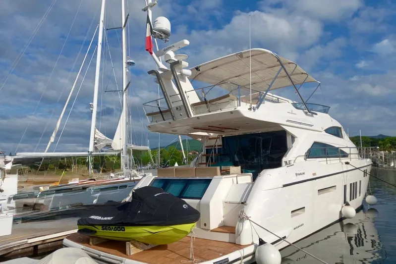 Zero One Yacht Photos Pics Luxury 2012 Fairline Squadron 65 yacht docked, featuring sleek design and spacious deck.