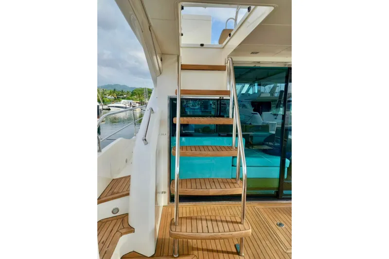 Zero One Yacht Photos Pics Staircase on 2012 Fairline Squadron 65 yacht with teak decking and stainless steel railings.