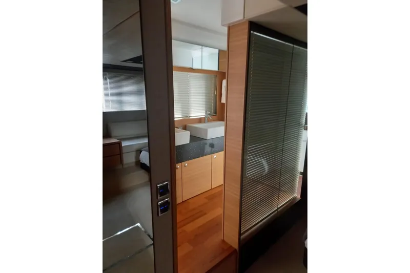 Zero One Yacht Photos Pics Interior of 2012 Fairline Squadron 65 yacht, featuring modern bathroom and bedroom design.