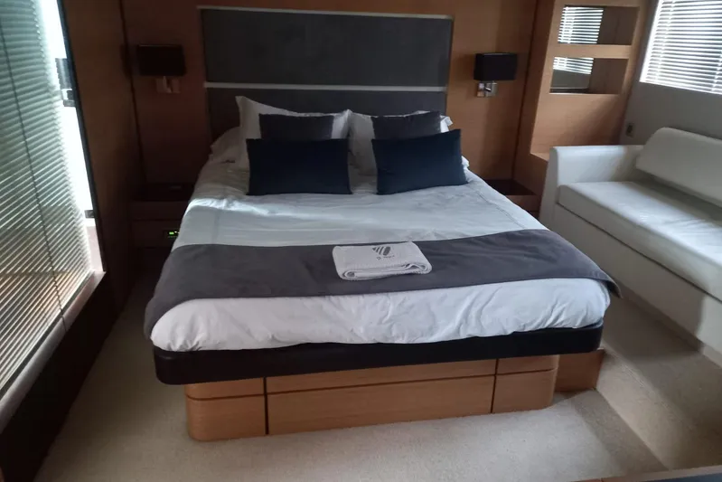 Zero One Yacht Photos Pics Luxurious bedroom interior of 2012 Fairline Squadron 65 yacht with modern decor.