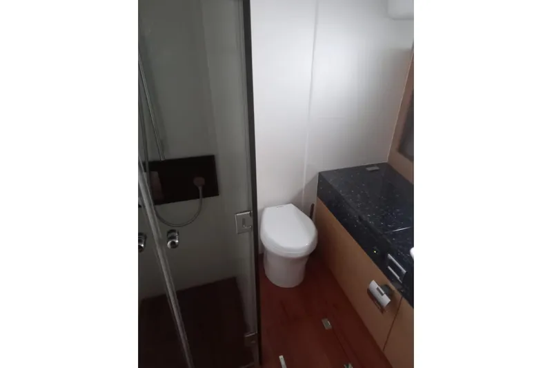 Zero One Yacht Photos Pics Bathroom interior of 2012 Fairline Squadron 65 yacht with modern fixtures.