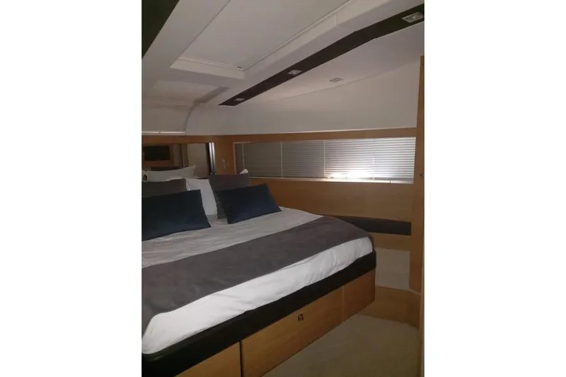 Zero One Yacht Photos Pics Luxurious bedroom interior of 2012 Fairline Squadron 65 yacht with modern design.