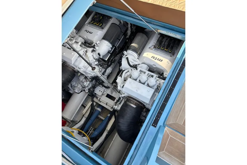 Jam Yacht Photos Pics Engine compartment of a 2013 Magnum 51 Bestia, showcasing dual MTU engines.