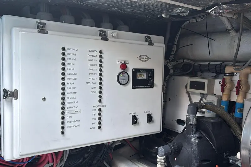 Jam Yacht Photos Pics Electrical control panel in a 2013 Magnum 51 Bestia boat engine room.