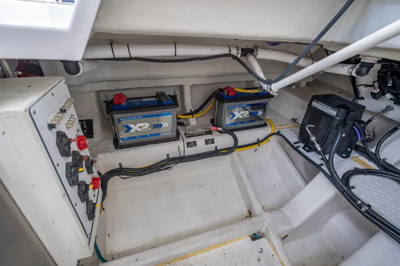  Yacht Photos Pics 2022 Cruisers Yachts 38 GLS OB engine compartment with batteries and wiring.