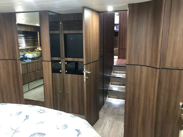  Yacht Photos Pics Interior of 2007 Fairline Squadron 68 yacht with wooden cabinetry and modern design.