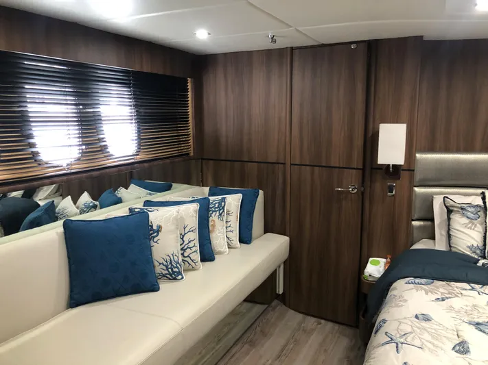  Yacht Photos Pics Luxurious cabin interior of 2007 Fairline Squadron 68 yacht with elegant decor and plush seating.