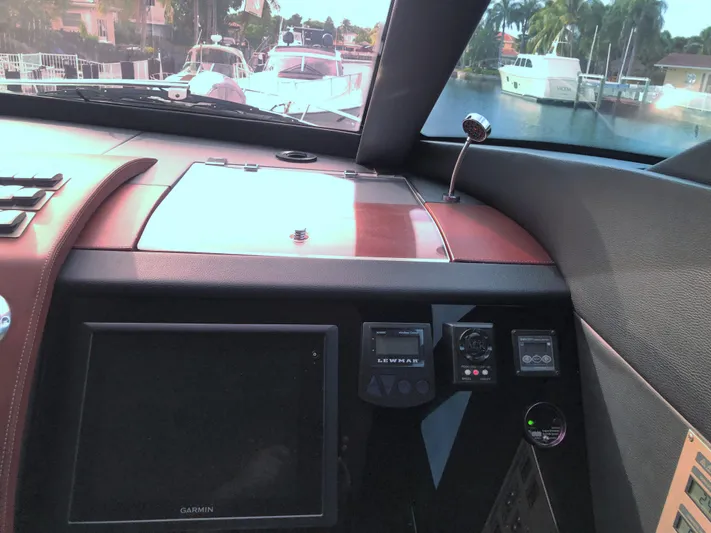  Yacht Photos Pics Interior view of 2007 Fairline Squadron 68 yacht dashboard with navigation equipment.